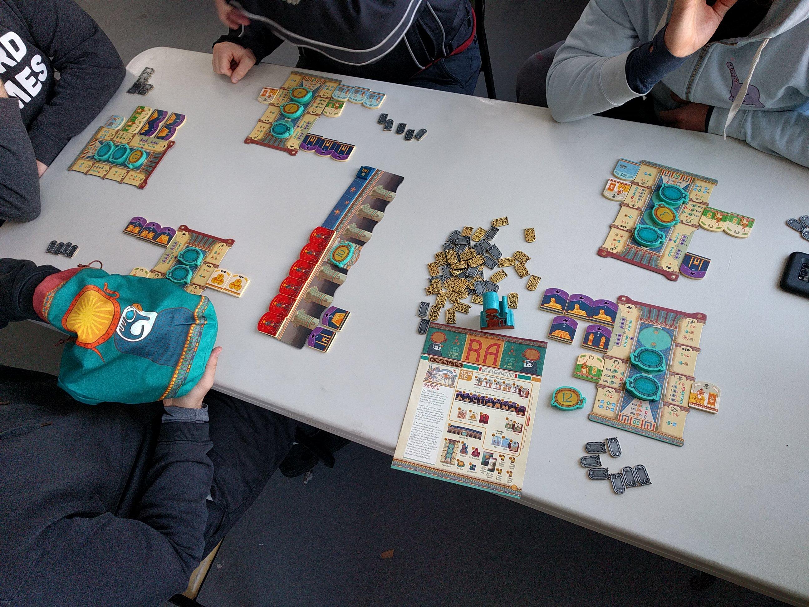 [Photo of a board game during play]